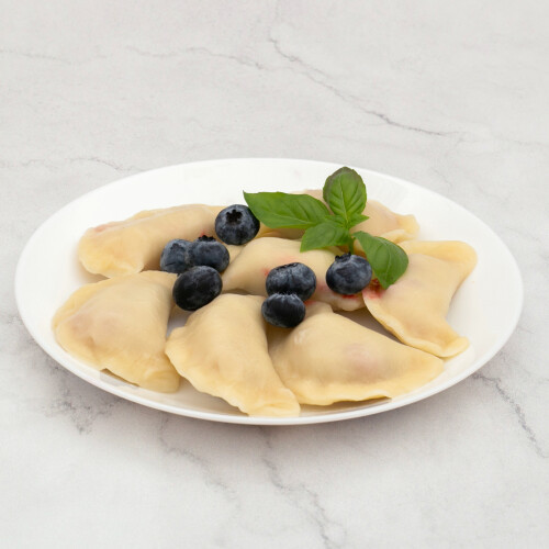 10219103 stolnica smaku Food dania gotowane pierogi z borowkami 1x1.jpg