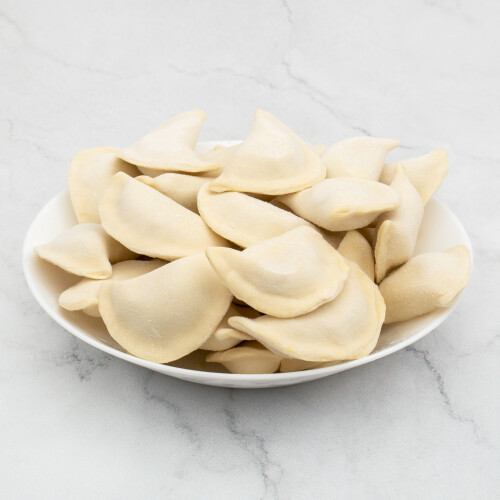 10219103 stolnica smaku Food dania mrozone pierogi z kapusta i grzybami 1x1.jpg