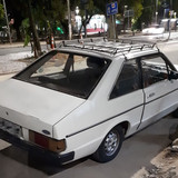 Ford Corcel L '86 branco visto de trás à noite