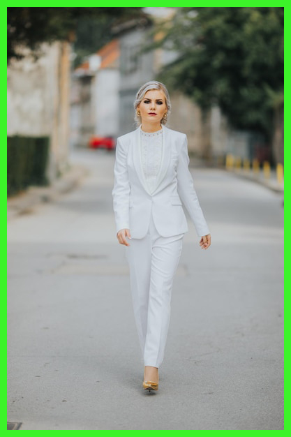 elegant fashionable caucasian female pretty white suit pants posing fashion photoshoot 181624 57477.jpg
