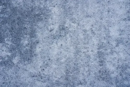 close up blue grey textured stone surface detailed rough speckled granite concrete varying shades da.webp