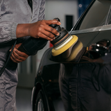 Black Women buffing car