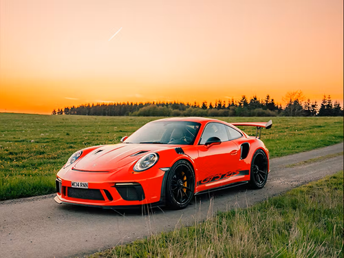 thumbnail Porsche 911 GT3 RS in Guards Red paint in Scottish countryside at sunset .png