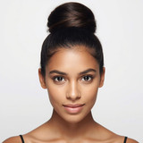 Front facing portrait of a beautiful 24 year old Indian fair skinned woman with a High Bun — neat or