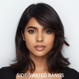 Front facing portrait of a beautiful 24 year old Indian fair skinned woman with Side Swept Bangs — l