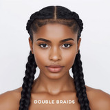 Front facing portrait of a beautiful 24 year old Indian fair skinned woman with Double Braids — two 