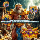 May include: Two gold rings with pear-shaped gemstones. One ring features a clear and a blue gemstone, the other has a clear and a pink gemstone. The rings are displayed on a white surface with a neutral background.