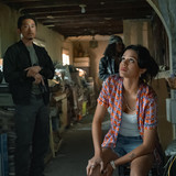 THE RIP. (L to R) Steven Yeun as Detective Mike Ro and Sasha Calle as Desi in The Rip. Cr. Claire Fo
