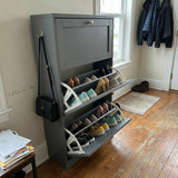 This sleek grey shoe storage unit has saved so much space in my hallway