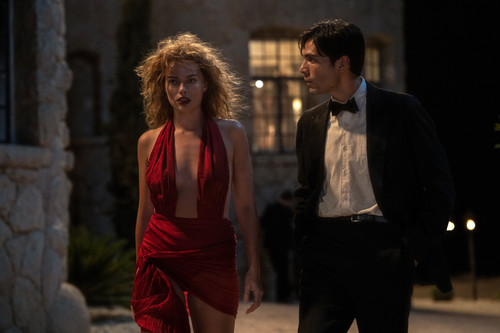 Margot Robbie plays Nellie LaRoy and Diego Calva plays Manny Torres in Babylon from Paramount Pictur.jpg
