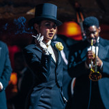 Li Jun Li plays Lady Fay Zhu and Jovan Adepo (back right) plays Sidney Palmer in Babylon from Paramo