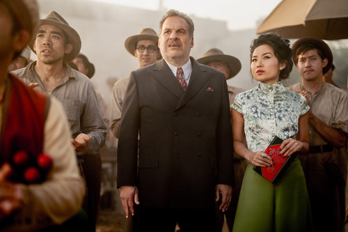 Jeff Garlin plays Don Wallach and Li Jun Li plays Lady Fay Zhu in Babylon from Paramount Pictures..jpg