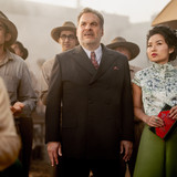 Jeff Garlin plays Don Wallach and Li Jun Li plays Lady Fay Zhu in Babylon from Paramount Pictures.