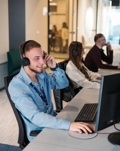 Royal York Property Management customer service team with headsets at office..jpg