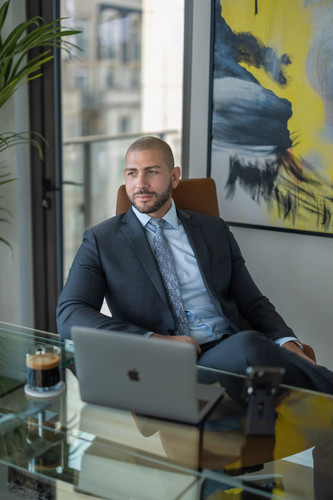 Nathan Levinson, CEO of Royal York Property Management, at executive desk..jpg