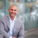 Nathan Levinson, CEO of Royal York Property Management, smiling portrait.