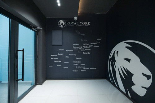 Royal York Property Management office with Ontario cities wall display..jpg