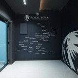 Royal York Property Management office with Ontario cities wall display.