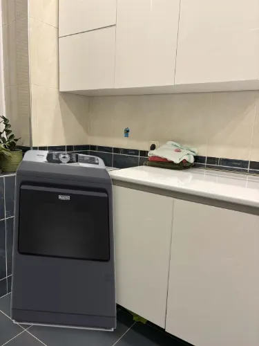 dryer in room shadow.webp