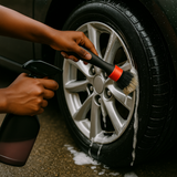 Black girl cleaning tires