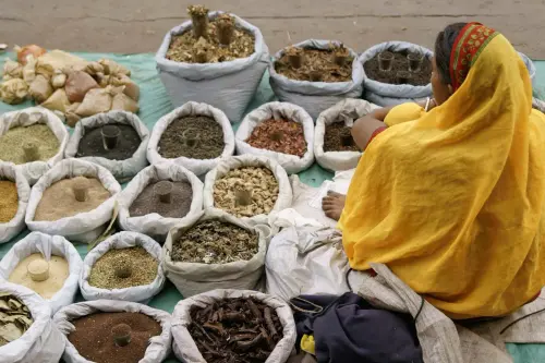 Vendor spice market Old Delhi India.webp