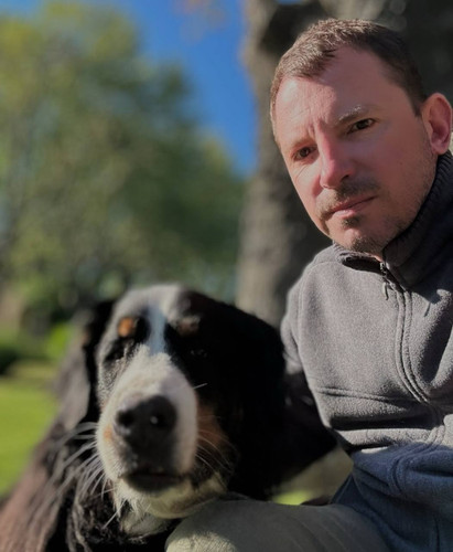 Evgeny Strzhalkovsky with a dog.jpg
