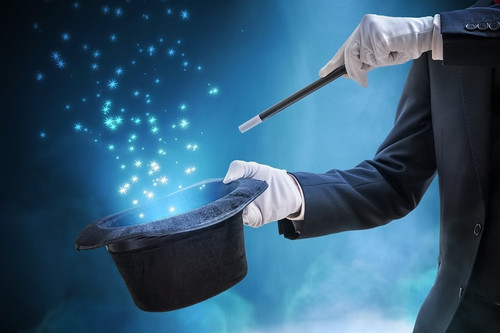 bigstock Magician Or Illusionist Is Sho 229402516.jpg