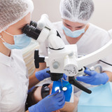 Лечение зубов под микроскопом цена в Москве