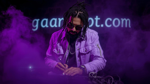 10. Bollywood musician in sexy rugged styling, lavender jacket, scribbling rap lyrics under dark pur.jpg