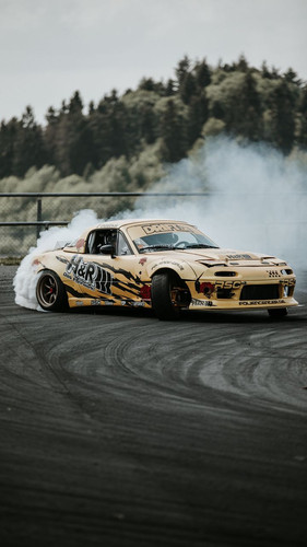 sports car drift race 131217 720x1280.jpg