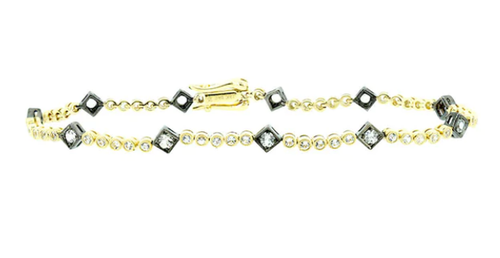 18 KARAT YELLOW GOLD WHITE SAPPHIRE AND DIAMOND BRACELET.png