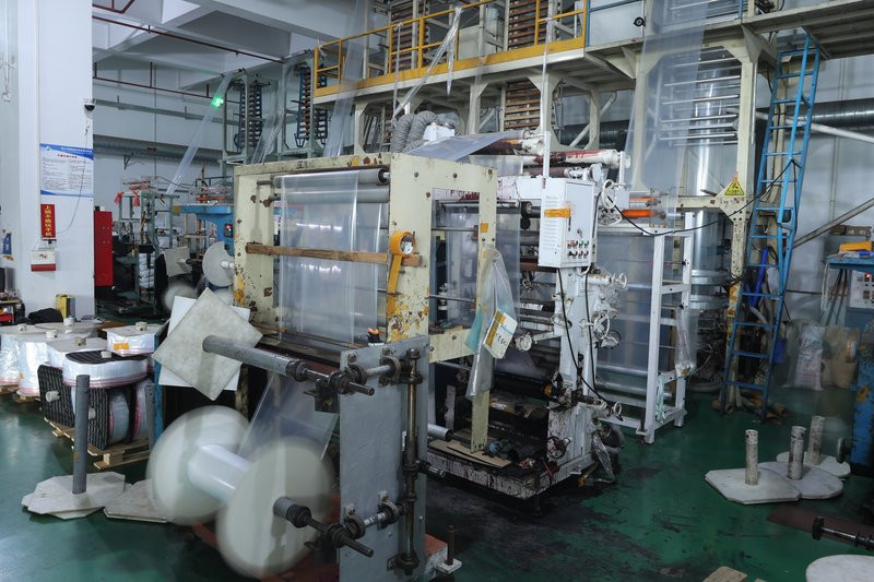 Blown film extrusion line producing PE film in the factory