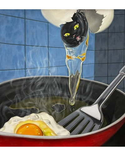 cat in yolk 6a99388a3389f 700 bordered.jpg