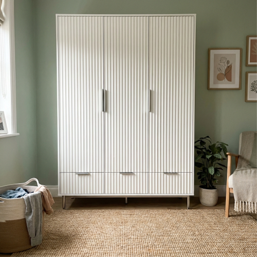 Spacious and Stylish: This 3 Door Wardrobe with Drawers Delivers.png