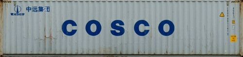 cosco shipping container on a freightliner train west coast main line northamptonshire uk T1XPRJ.jpg