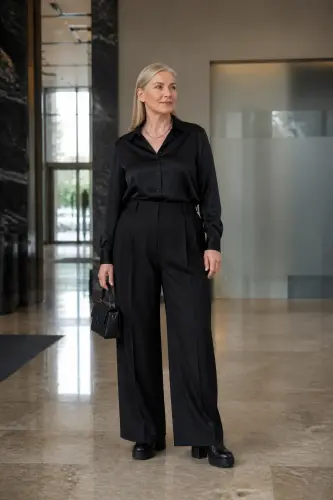 plus size date night outfits over 40 9 timeless all black pleated look 9 1791469464.4