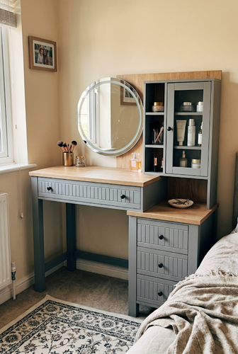 Vanity table from DHS with drawers and round mirror.png