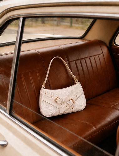 Ivory Hobo Shoulder Bag with Gold Tone Buckle Details.png