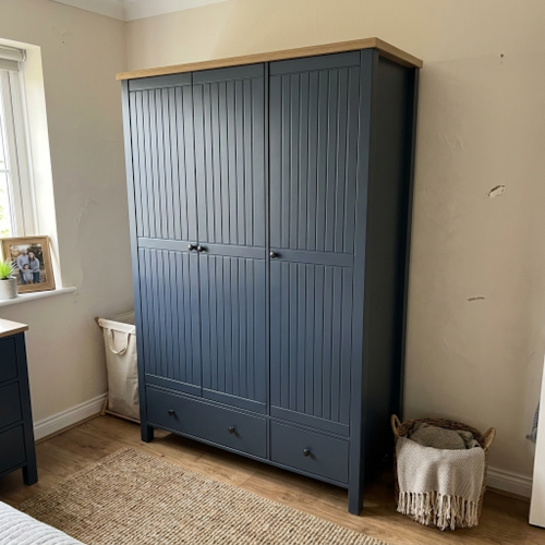 3 Door Wardrobe with Drawers for Sorting Hanging Clothes and Daily Extras.png