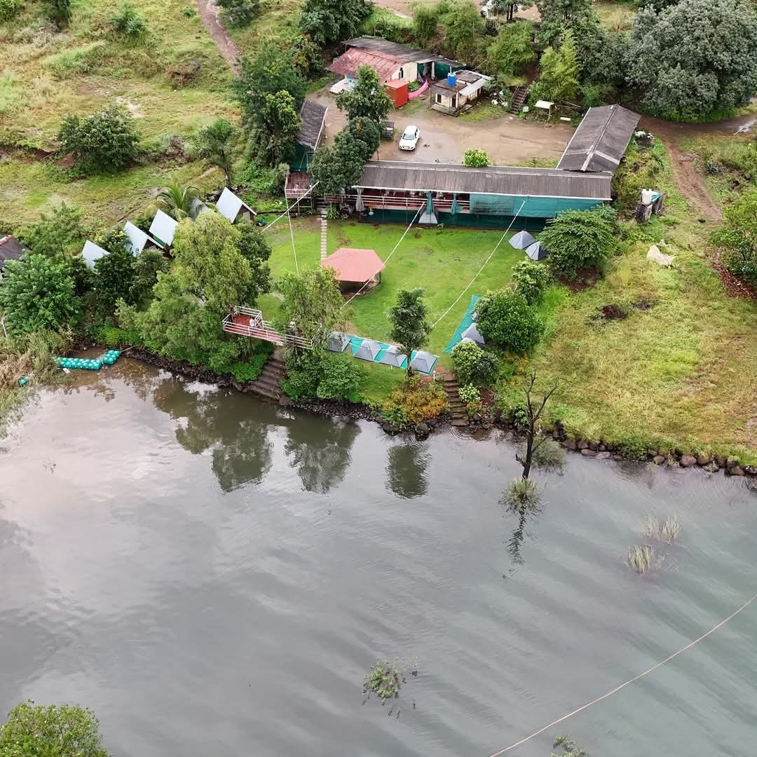 How to reach Pawna Lake from Mumbai, aerial view of the campsite beside the lake