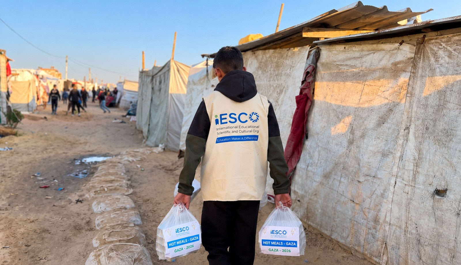 IESCO team distributing meals