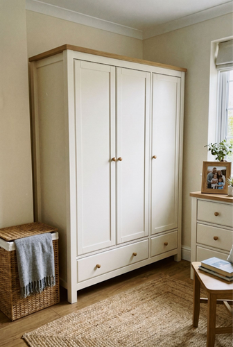 Pairing a White Wardrobe with Drawers Against Neutral Walls for a Seamless Finish.png