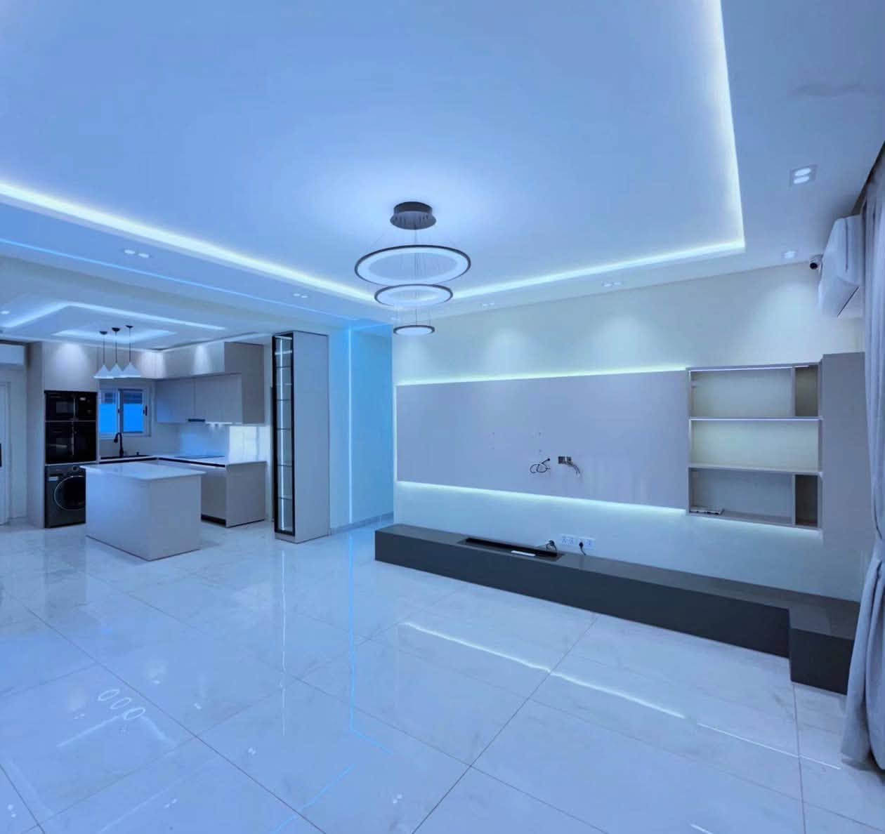 Luxury Contemporary Residential Estate - Open-plan living space and designer kitchen with central island
