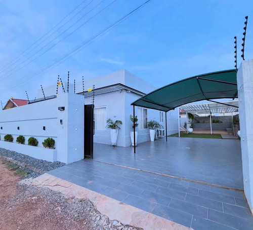 Luxury Contemporary Residential Estate in Enugu - Paved compound, carport canopy, and electric perimeter fence