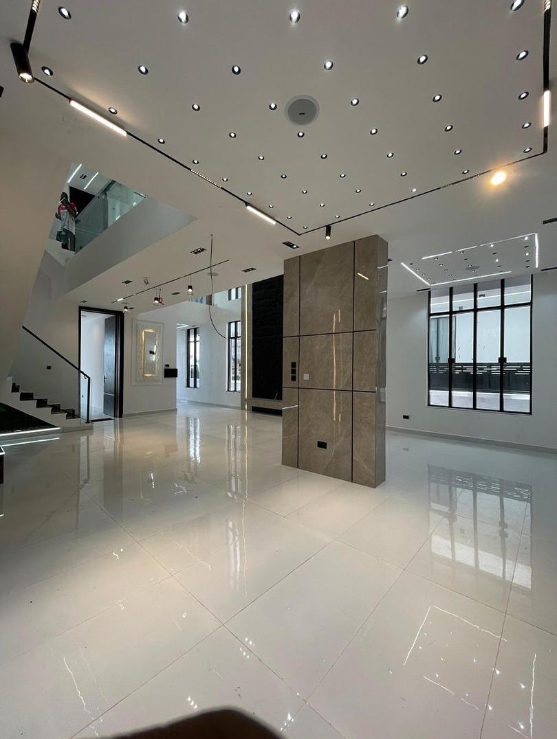 Luxury 6-Bedroom Contemporary Home - Rooftop terrace lounge view 2