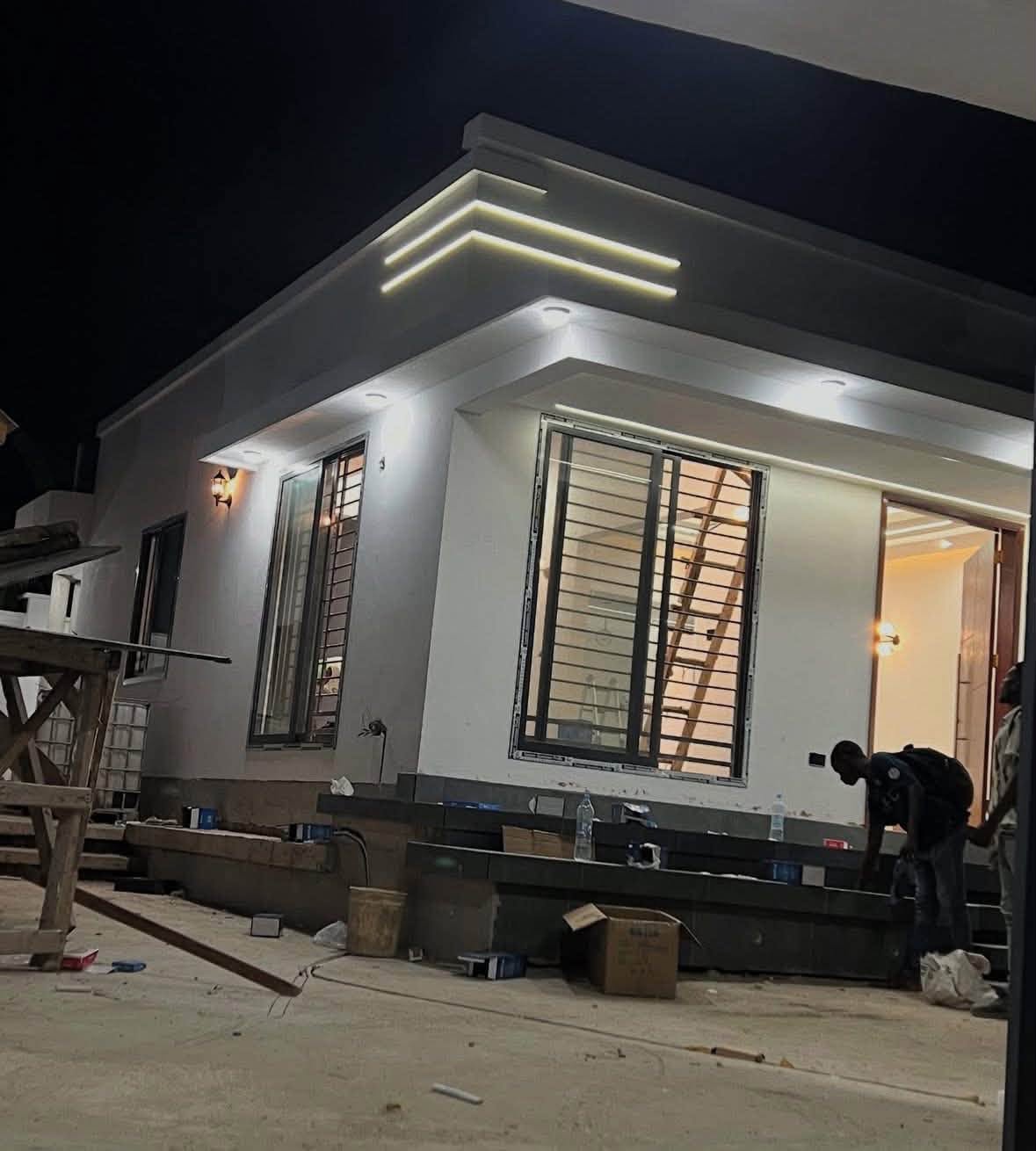Contemporary Residential Villa - Exterior evening view with entrance porch and craftsmanship