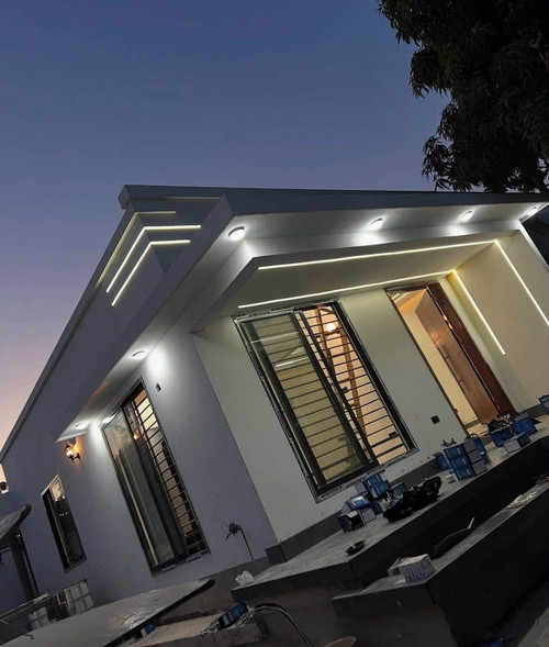 Contemporary Residential Villa Project in Enugu - Architectural dusk view with linear LED lighting