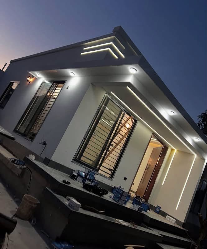Contemporary Residential Villa - Front elevation with illuminated linear profile channels
