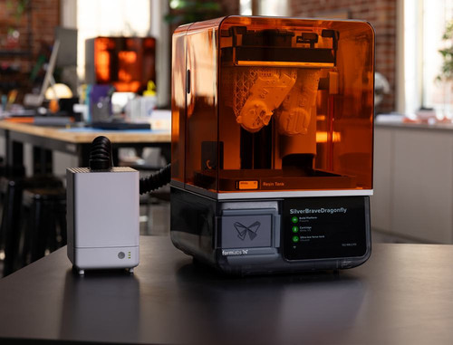 printer on a workbench with a fume extractor.jpg