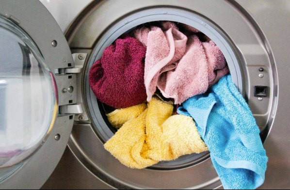 The Simple Reason Your Towels Smell Musty Even After Washing